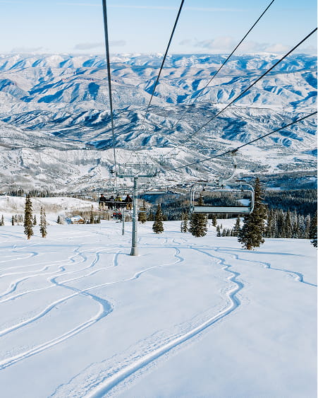 view from lift at snowmass mountain in winter