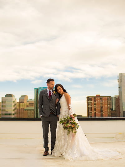wedding couple on roof of limelight denver