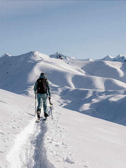 skier skinning up mountain