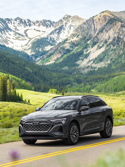 audi suv driving in aspen mountains