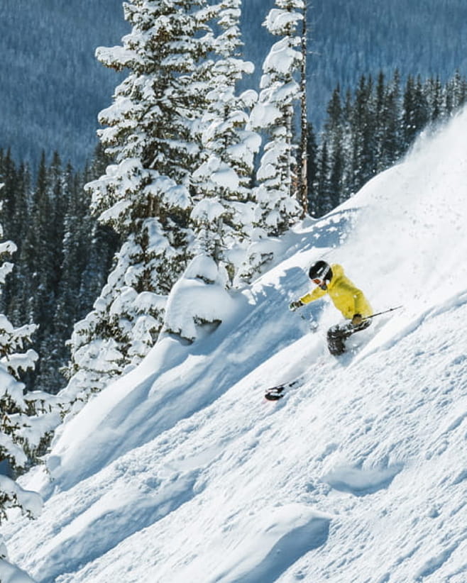 skier skiing down mountain