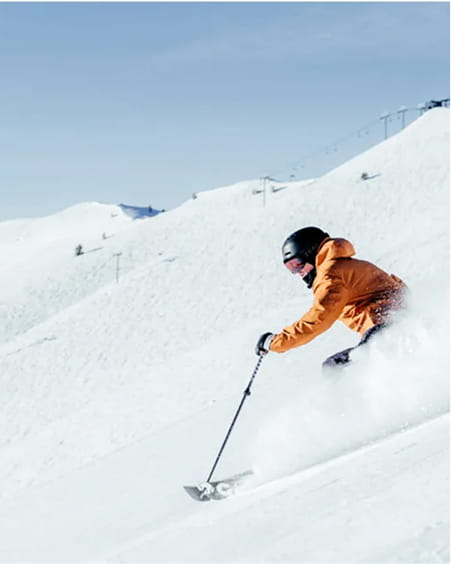 skier skiing down mountain