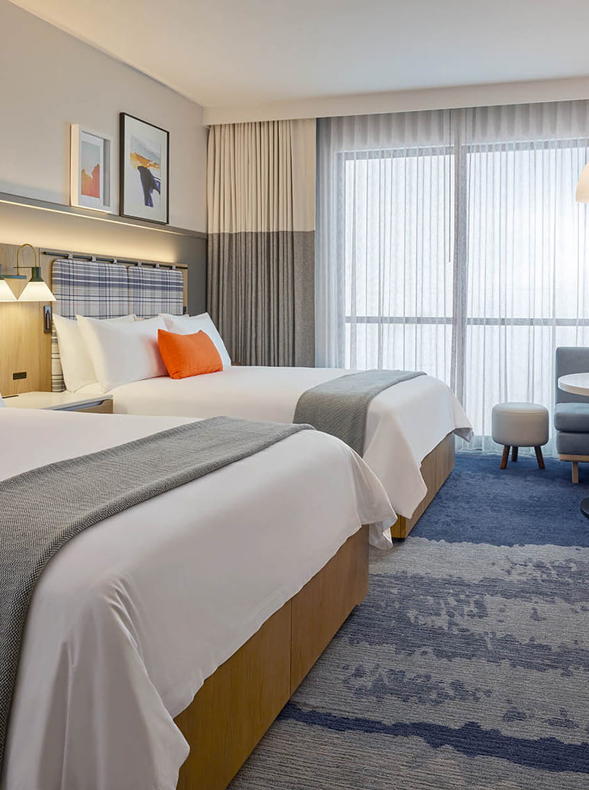 two queen beds in guest room