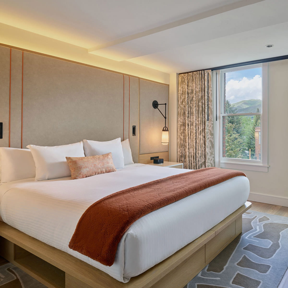 bed in guestroom at limelight aspen