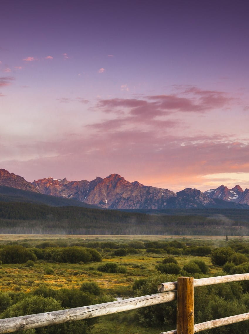 Sunset over mountains and field in Ketchum