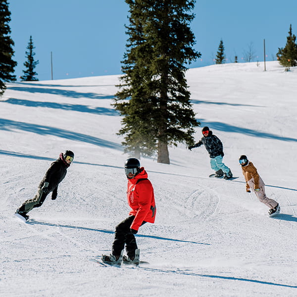 snowboard lesson happening on mountain