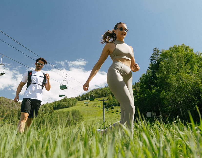 two people hiking aspen mountain in summer
