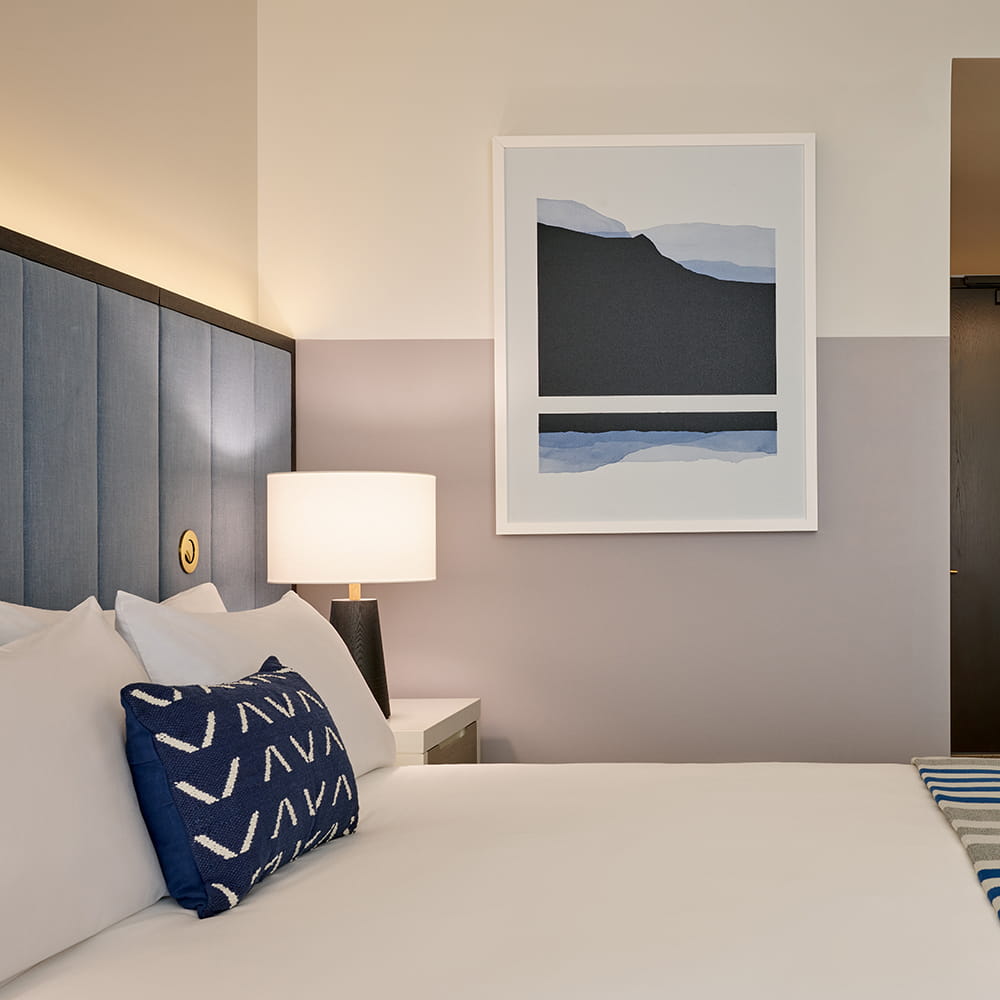 bed in guestroom at limelight boulder