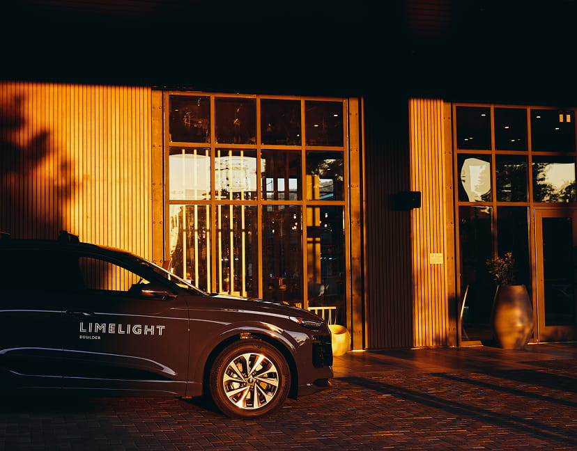 Audi in front of limelight boulder