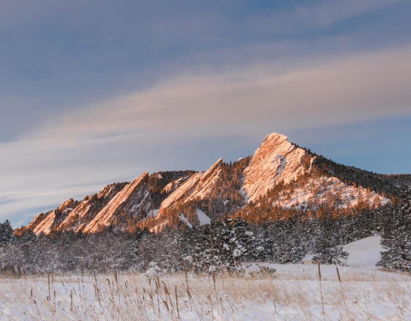 Winter view of mountains in Boulder with snow-capped peaks