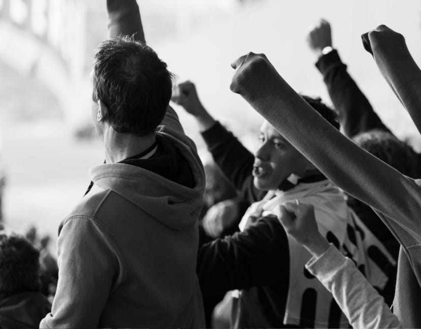 people cheering at event