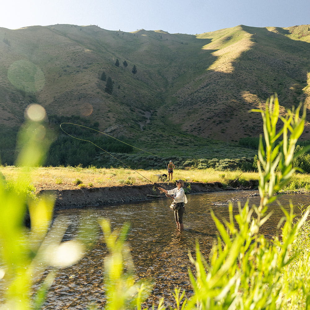 woman fly fishing in sun valley idaho
