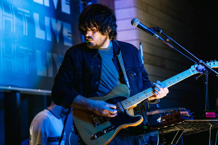 guitarist performing on stage