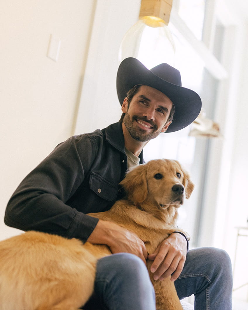 Man with golden retriever 