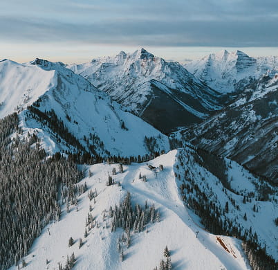 aerial view of aspen mountains in winter