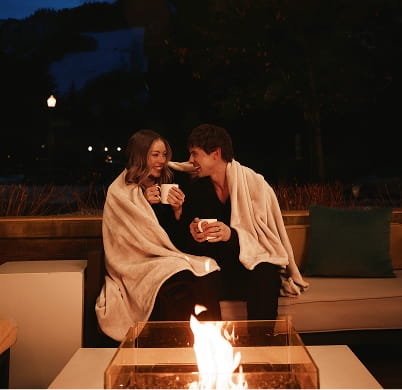 couple on terrace at night