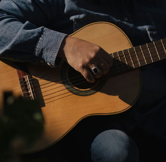 person playing guitar