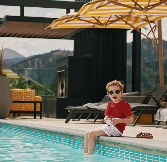 little boy by pool