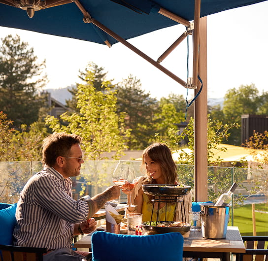 couple having meal on ajax patio