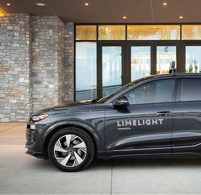 limelight audi suv in front of hotel