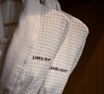 white robes in guestroom