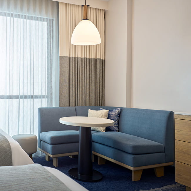 table and chairs in hotel room