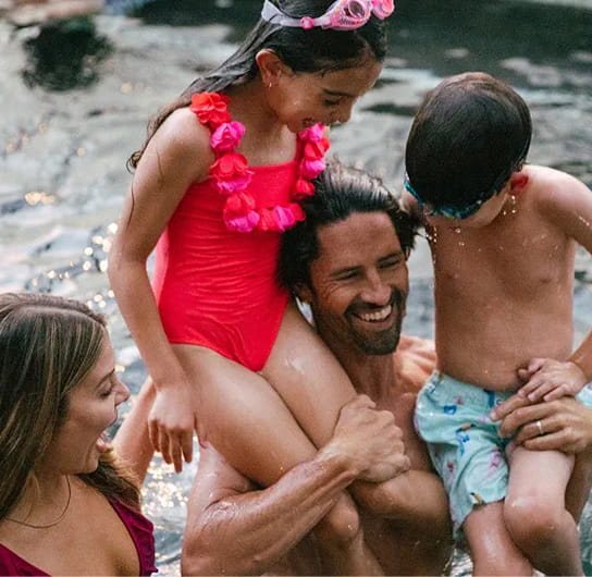 family in hot tub at limelight snowmass