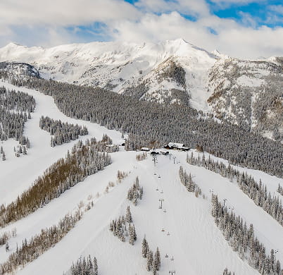 aerial view of snowmass mountains in winter