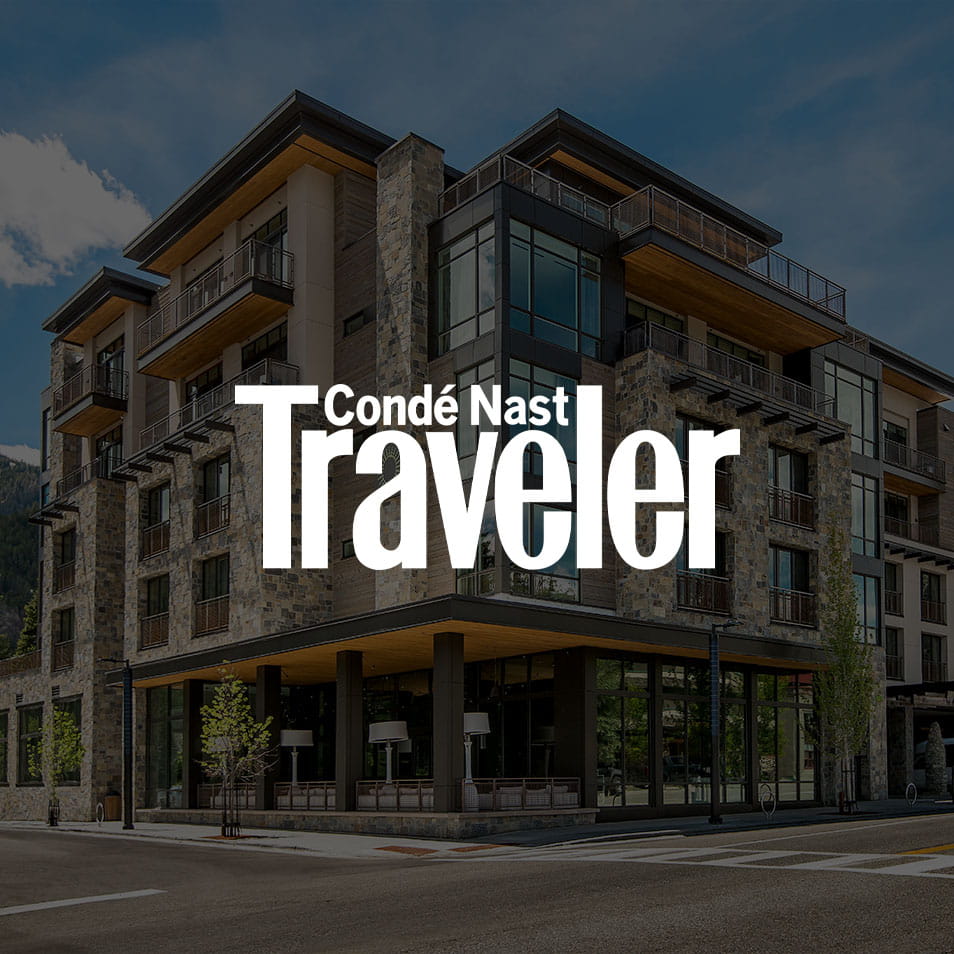 "Condé Nast Traveler" text overlays the image of the Limelight Ketchum, a multi-story modern stone building.