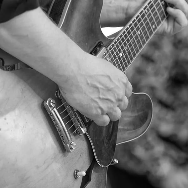 man playing guitar