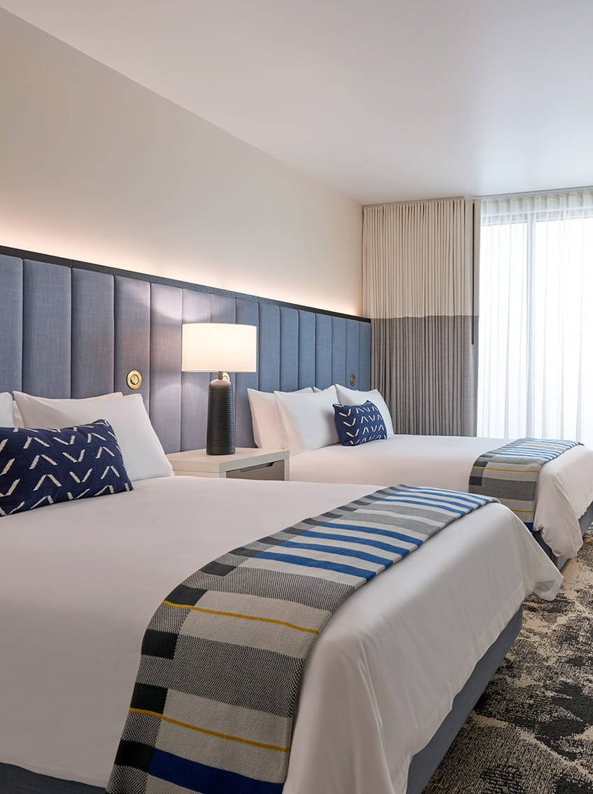 two queen beds in the campus queen room