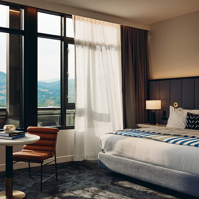 bed and table in suite room