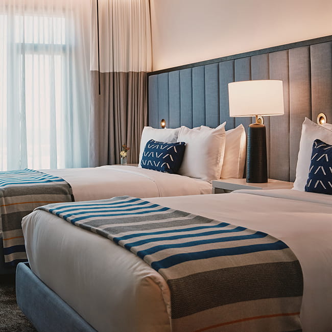 two queen beds in guest room