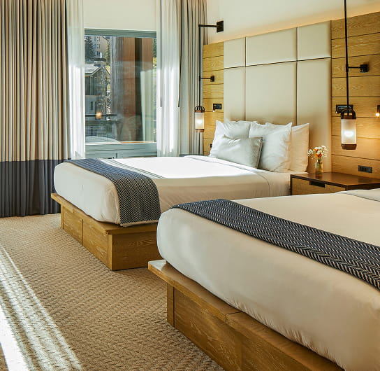 two queen beds in guest room