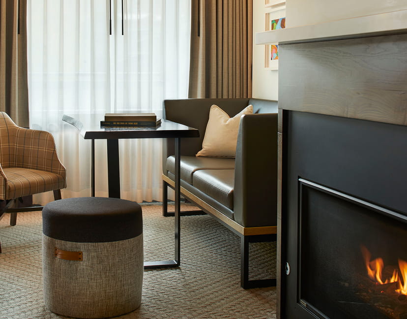 fireplace and seating area in guestroom