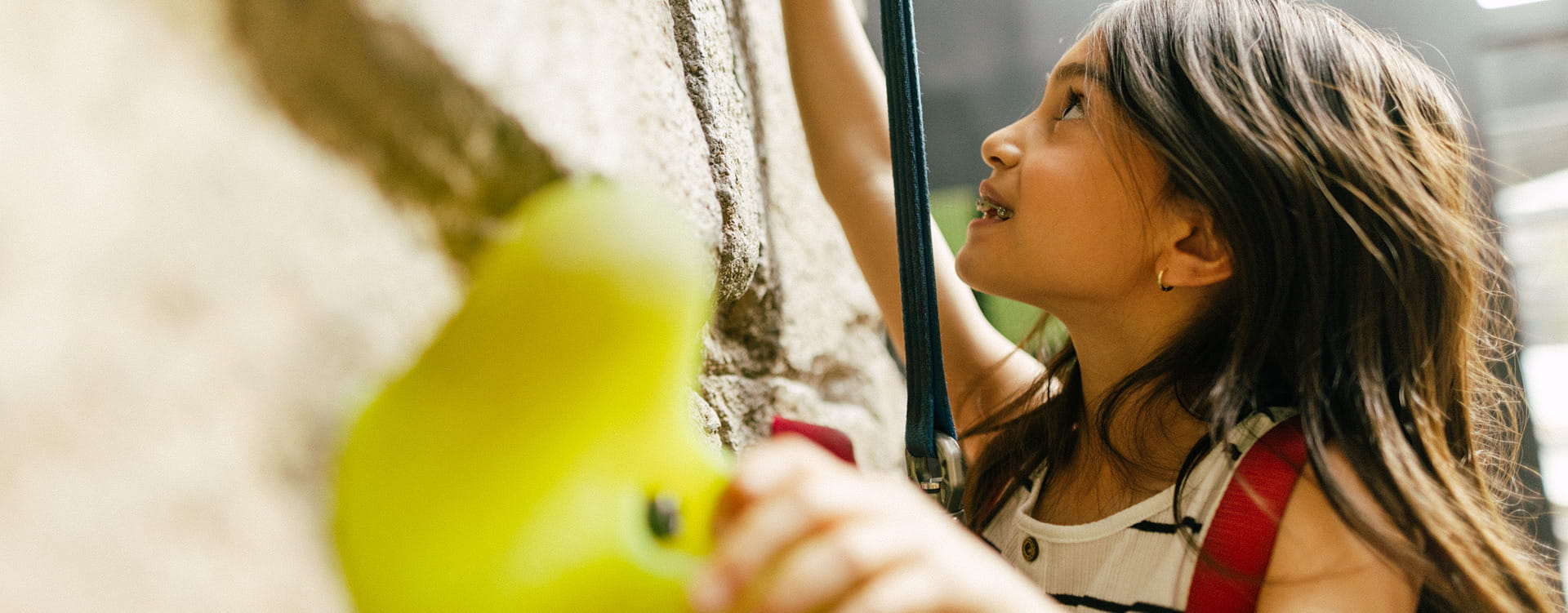 girl on climbing wall