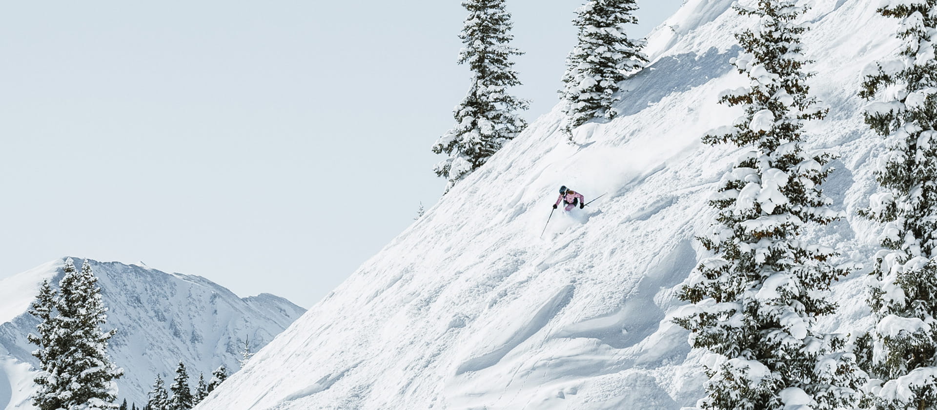 skier skiing down mountain