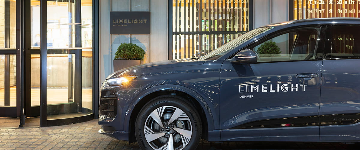 audi limelight car in front of hotel entrance