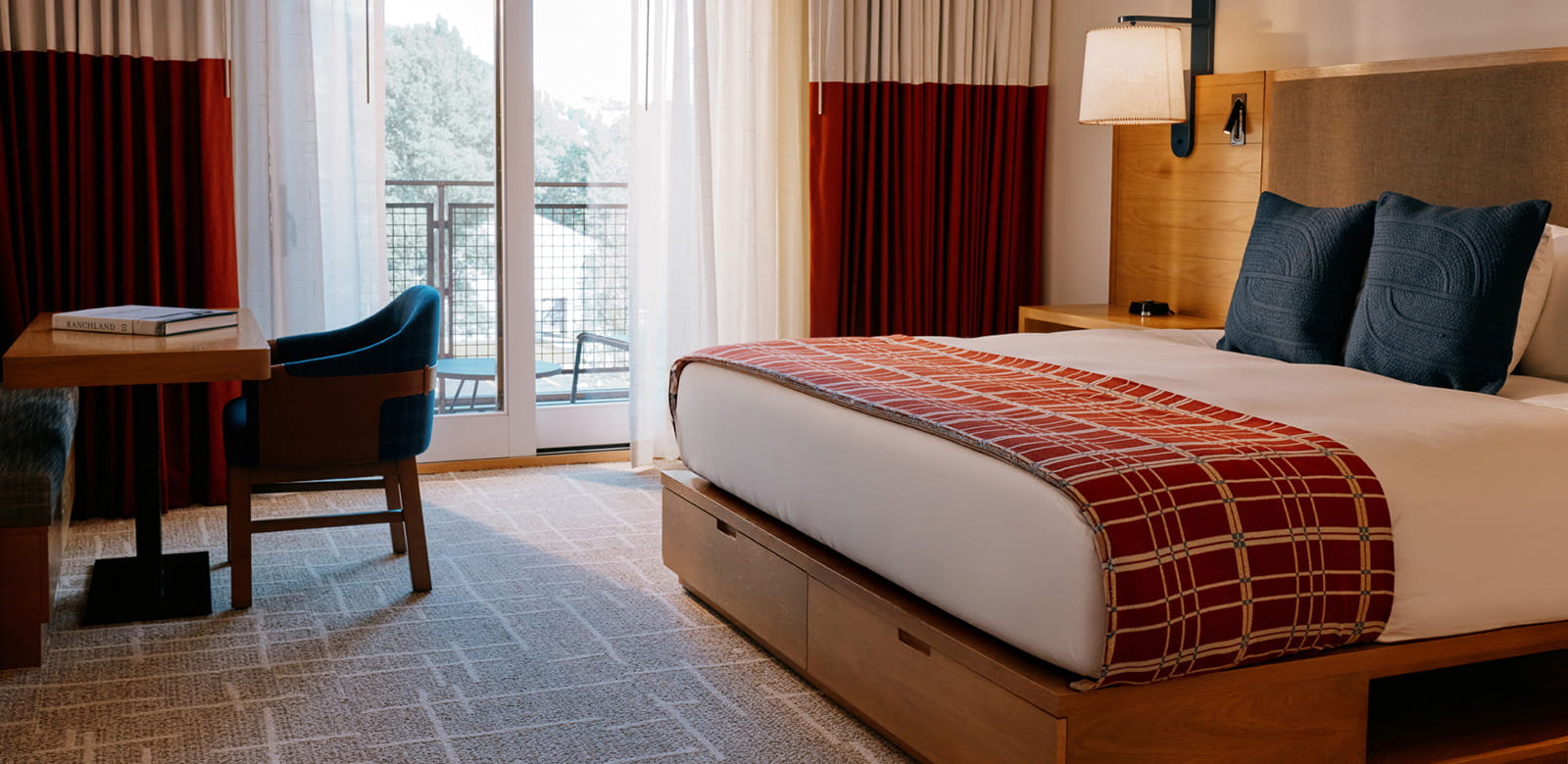 bed and table in guest room