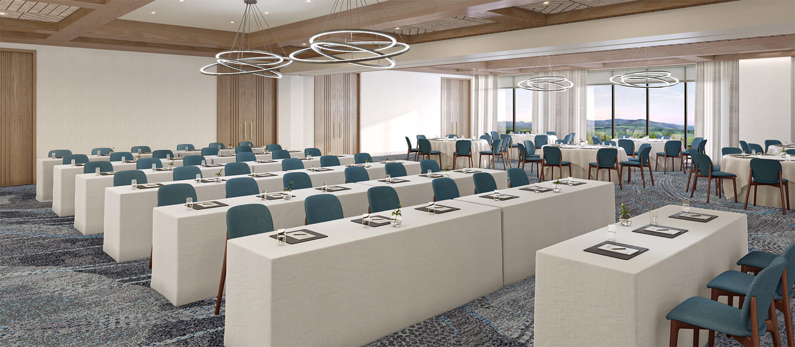 large meeting space overlooking mountains