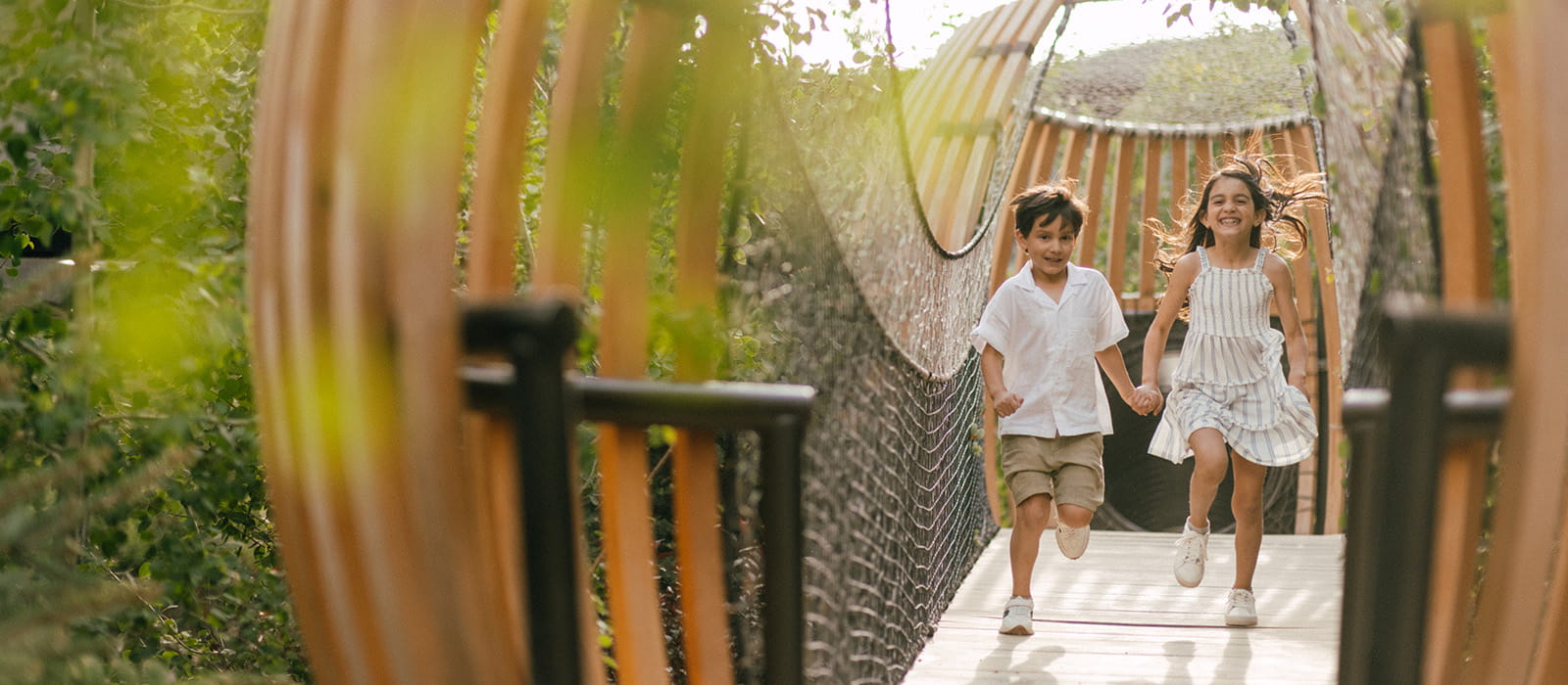 two kids playing on playground