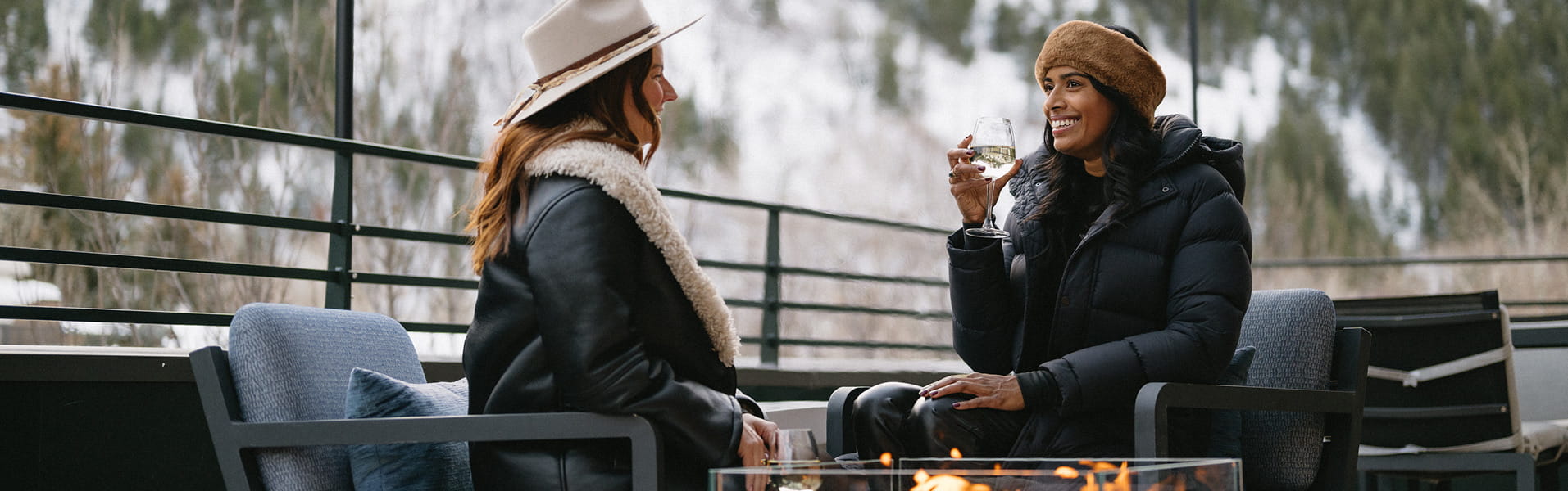 two women talking on limelight aspen terrace
