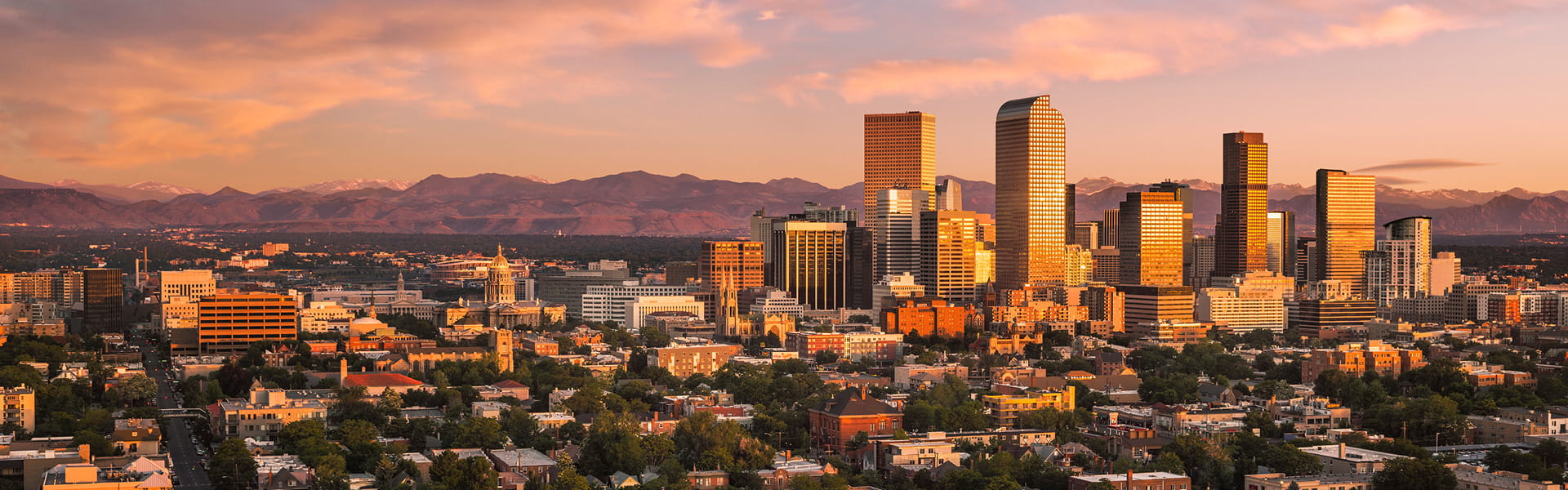 aerial view of downtown denver at a summer sunset