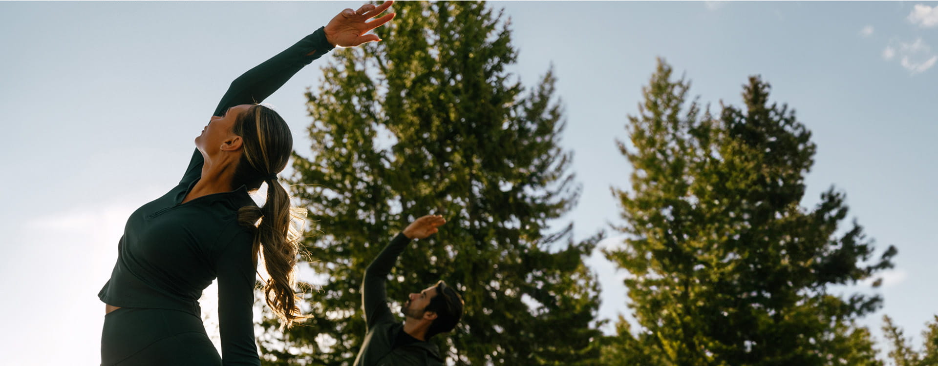 woman doing yoga outside