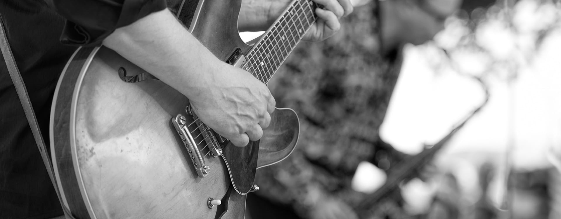 man playing guitar