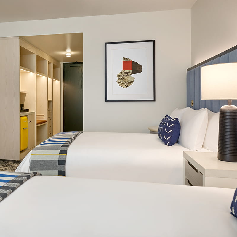 bed and art in guest room